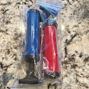 Brand new Red and Blue portable ball pump kits. Pumps for all kinds of balls.